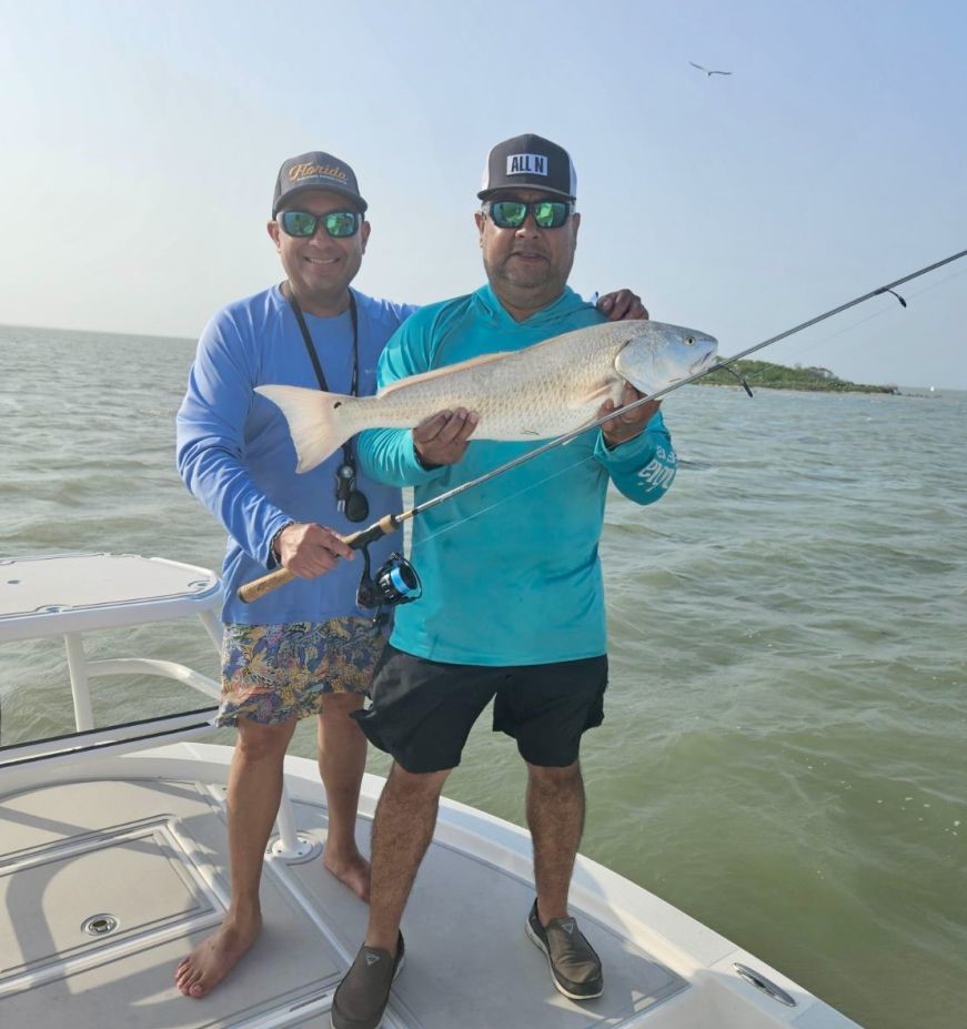 Anglers fishing with fishing rods at South Padre Island