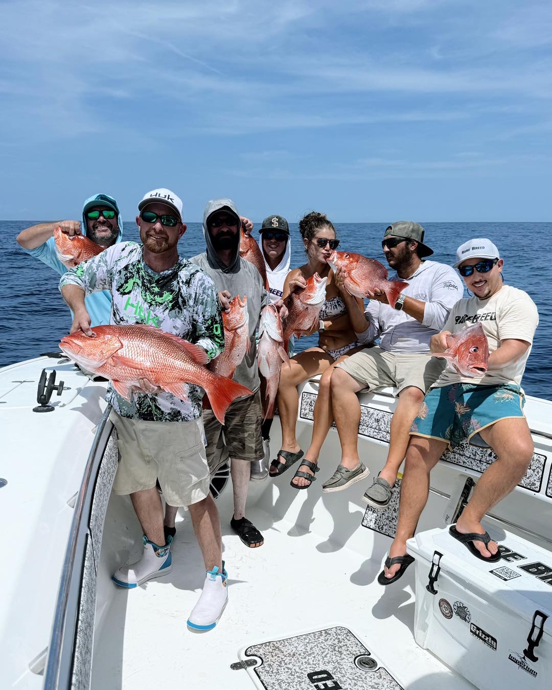 Successful red snapper fishing trip on boat in Port Orange FL with multiple large red snapper caught