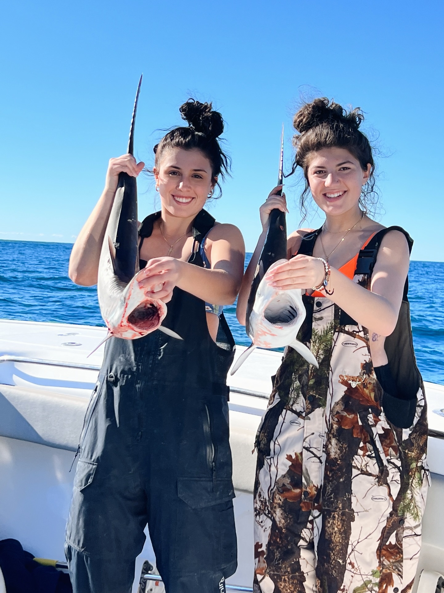Port Orange fishing charter boat with anglers catching tarpon, cobia and grouper offshore