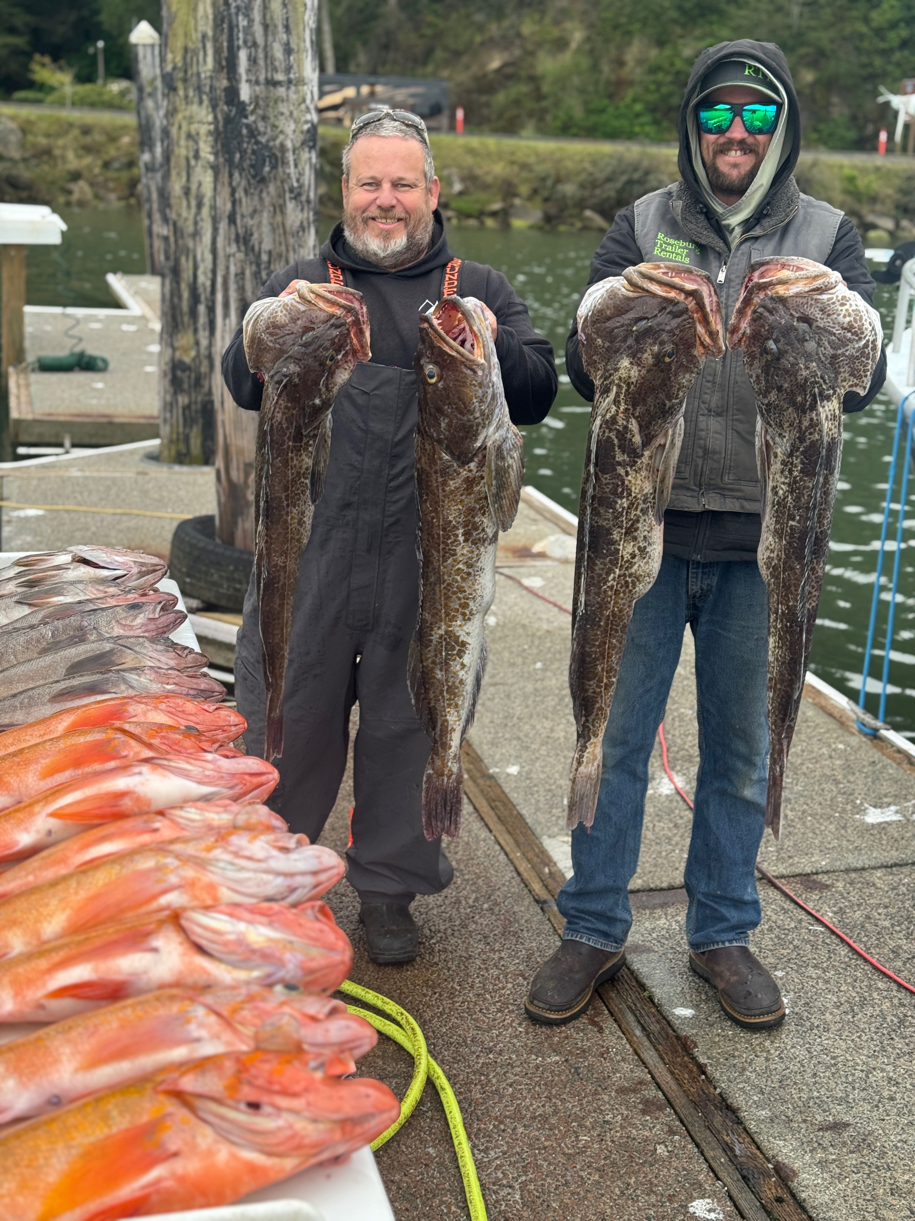 Oregon offshore fishing charter boat with anglers bottom fishing for rockfish on Pacific Ocean