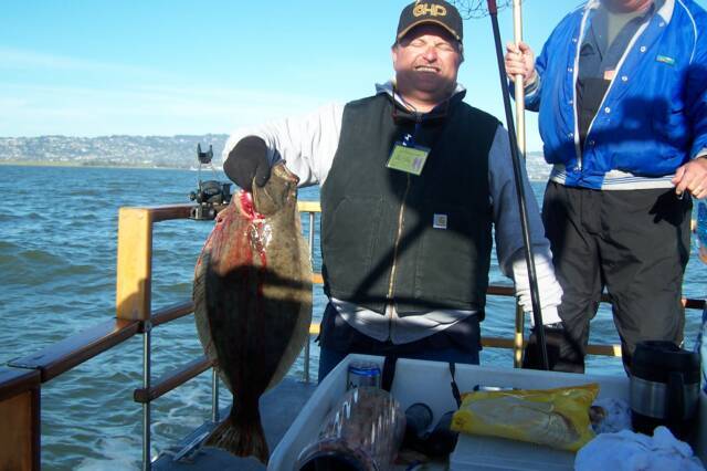 Angler fishing in Richmond with one fish