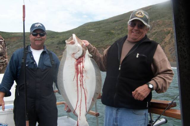 Two people in Richmond enjoying a fishing trip