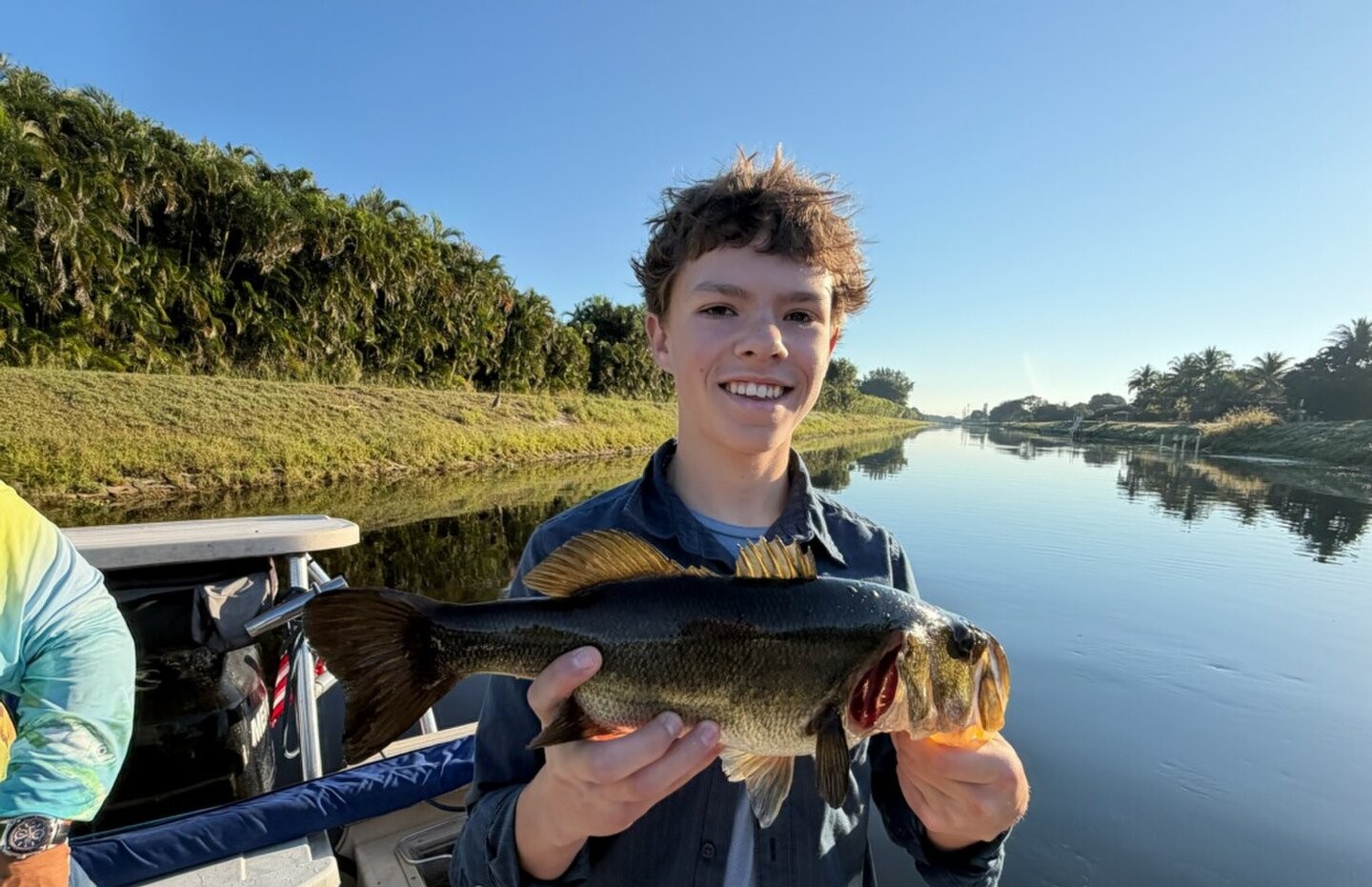 Fresh caught bass displayed on fishing boat in Fort Lauderdale FL waterway