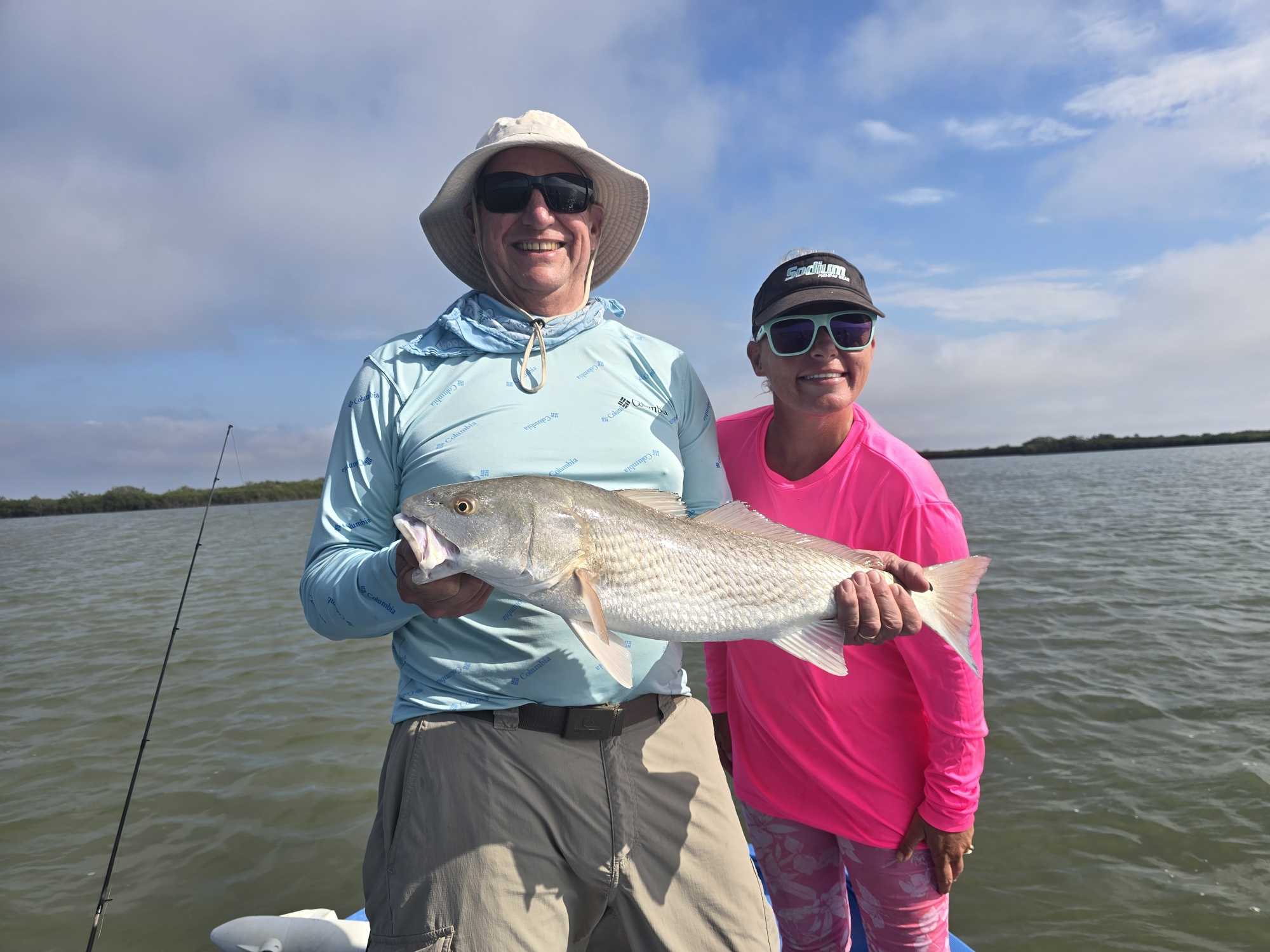 Successful redfish catch during guided fishing tour in Homosassa FL waters