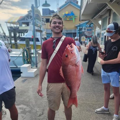 Two people fishing in Destin