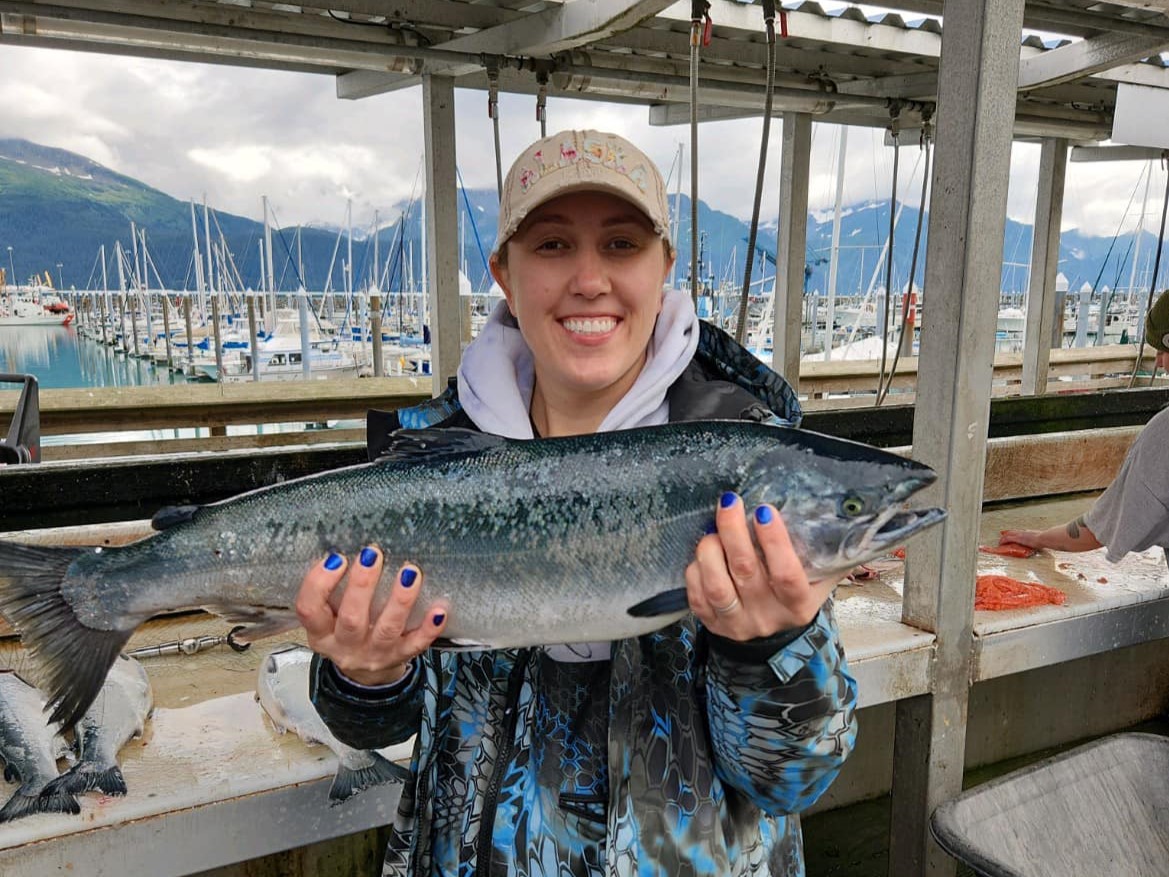 Photograph of a 26-inch sea trout caught while fishing in Alaska