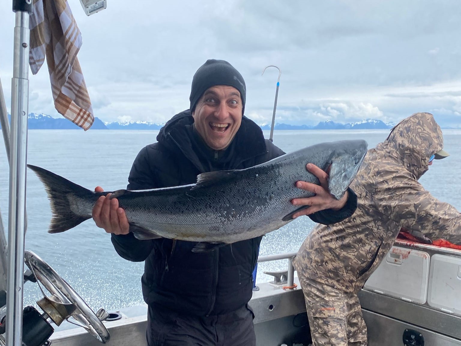 A fisherman enjoying a successful day of fishing in Seward