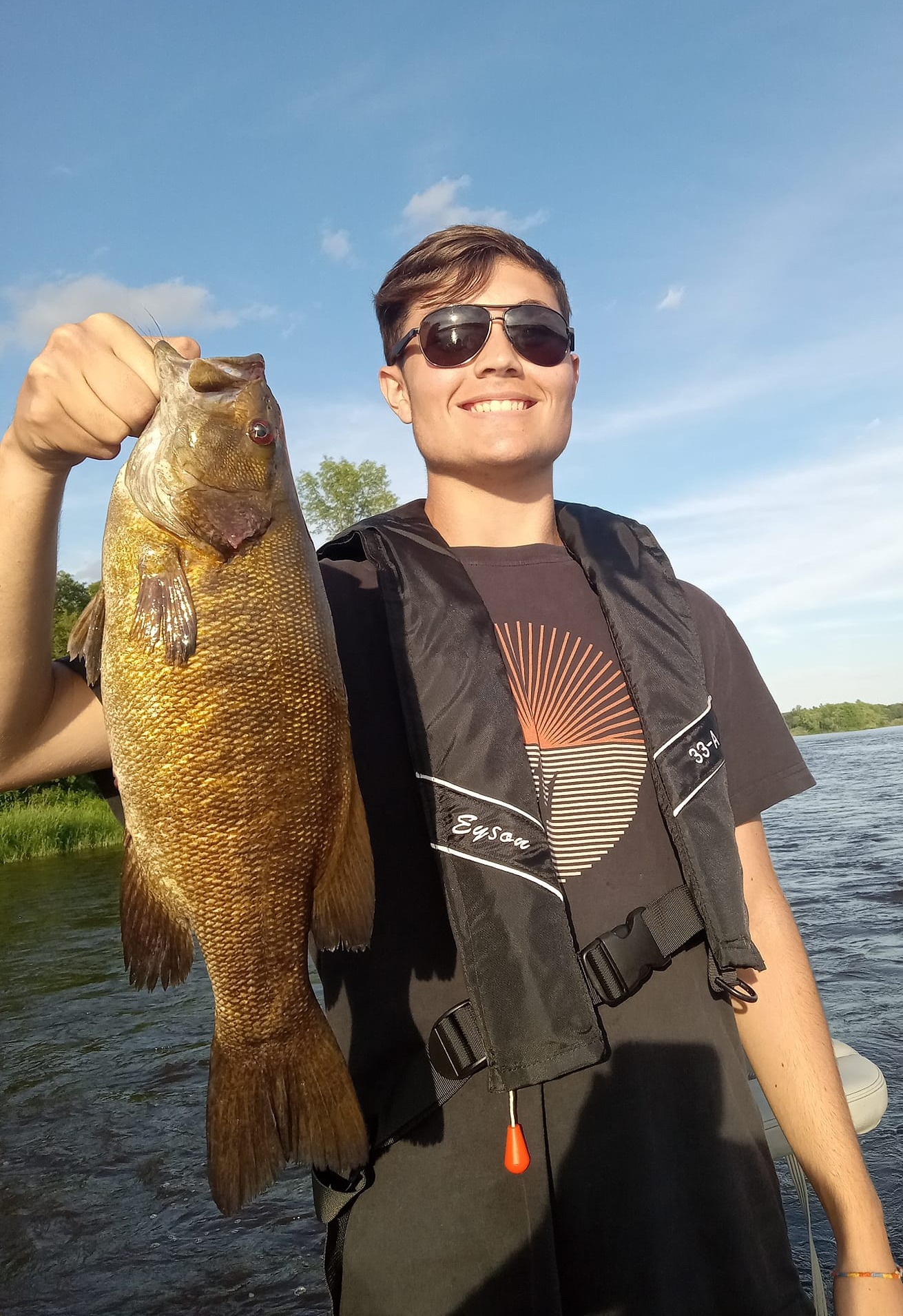 Angler holding a 22-inch fish in Minnesota