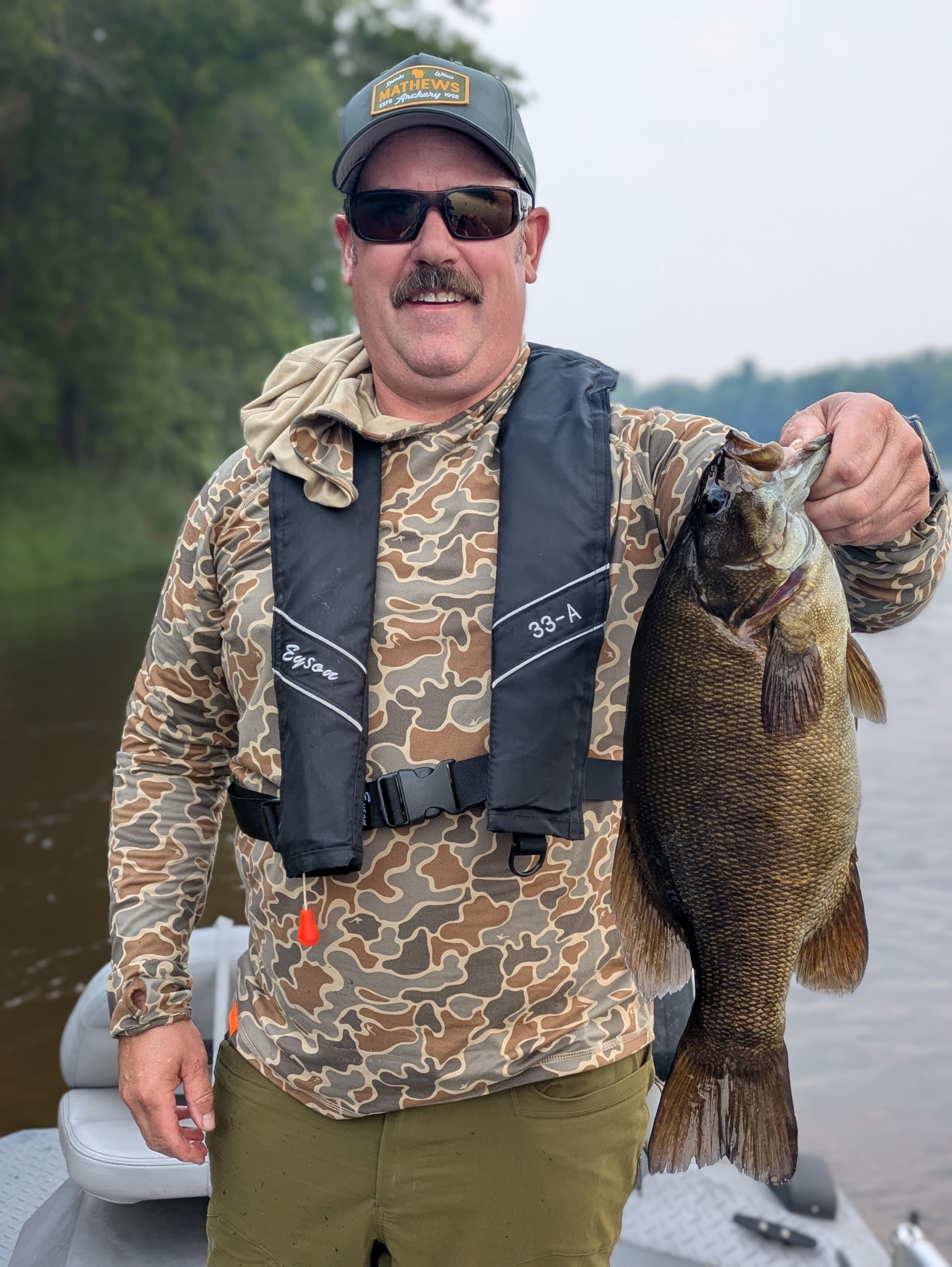 A lone angler reels in a 19-inch catch in Minnesota