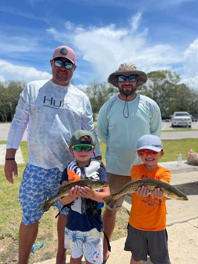 Two spotted weakfish, 17 inches long, caught while fishing in Santa Rosa Beach