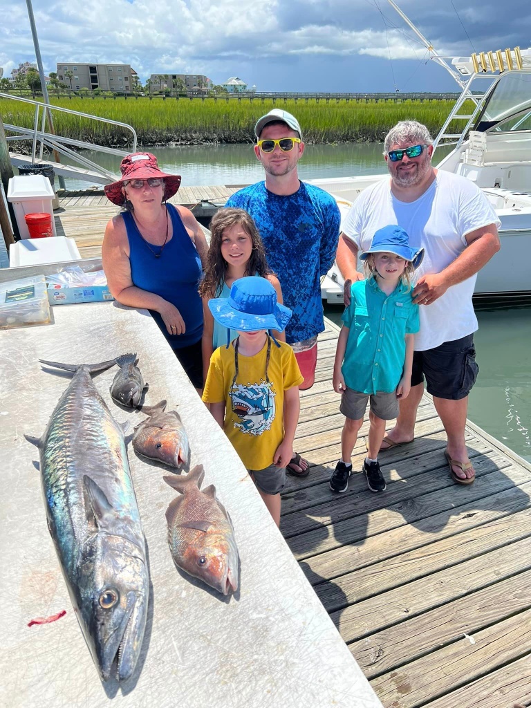 Couple fishing with big fish in SC