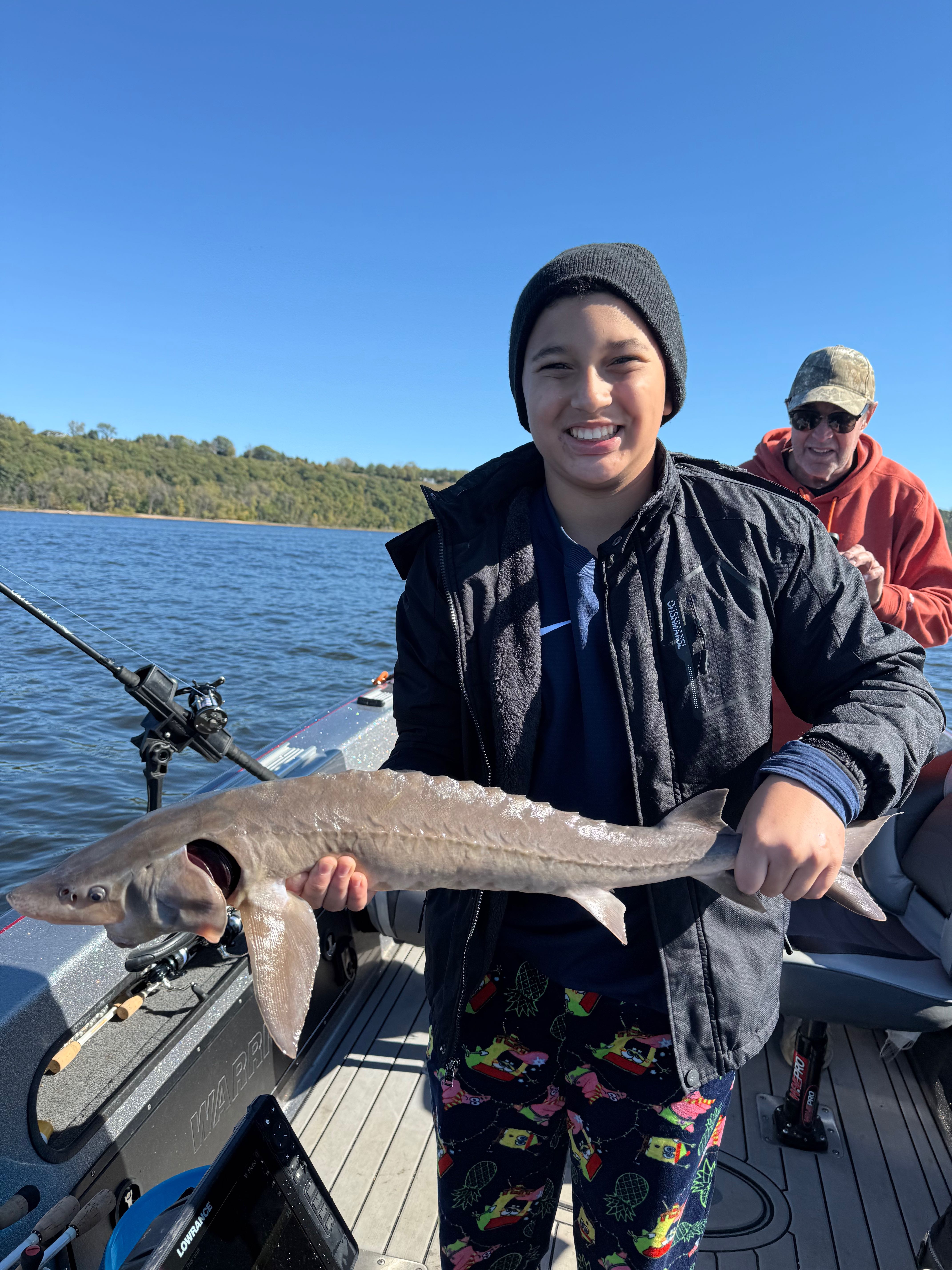 Lake sturgeon caught while fishing on boat in Stillwater MN waters