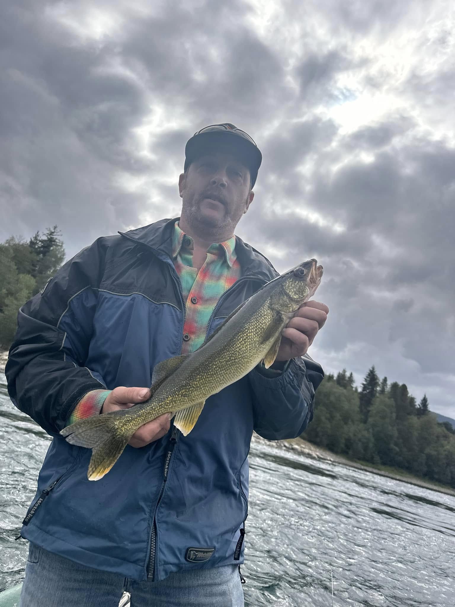 Angler catching a fish in BC