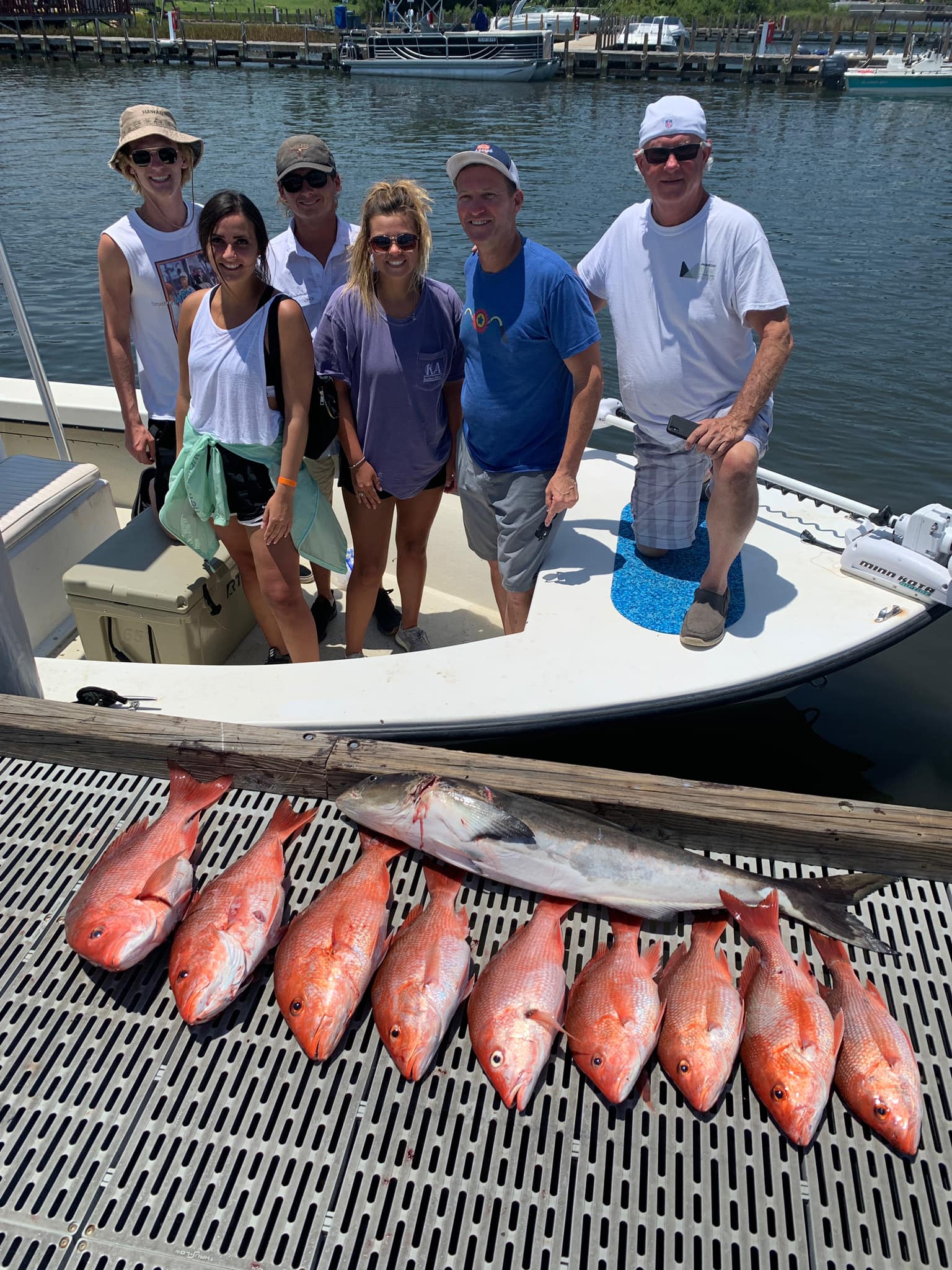 A group of 6 people fishing in Pensacola, Florida