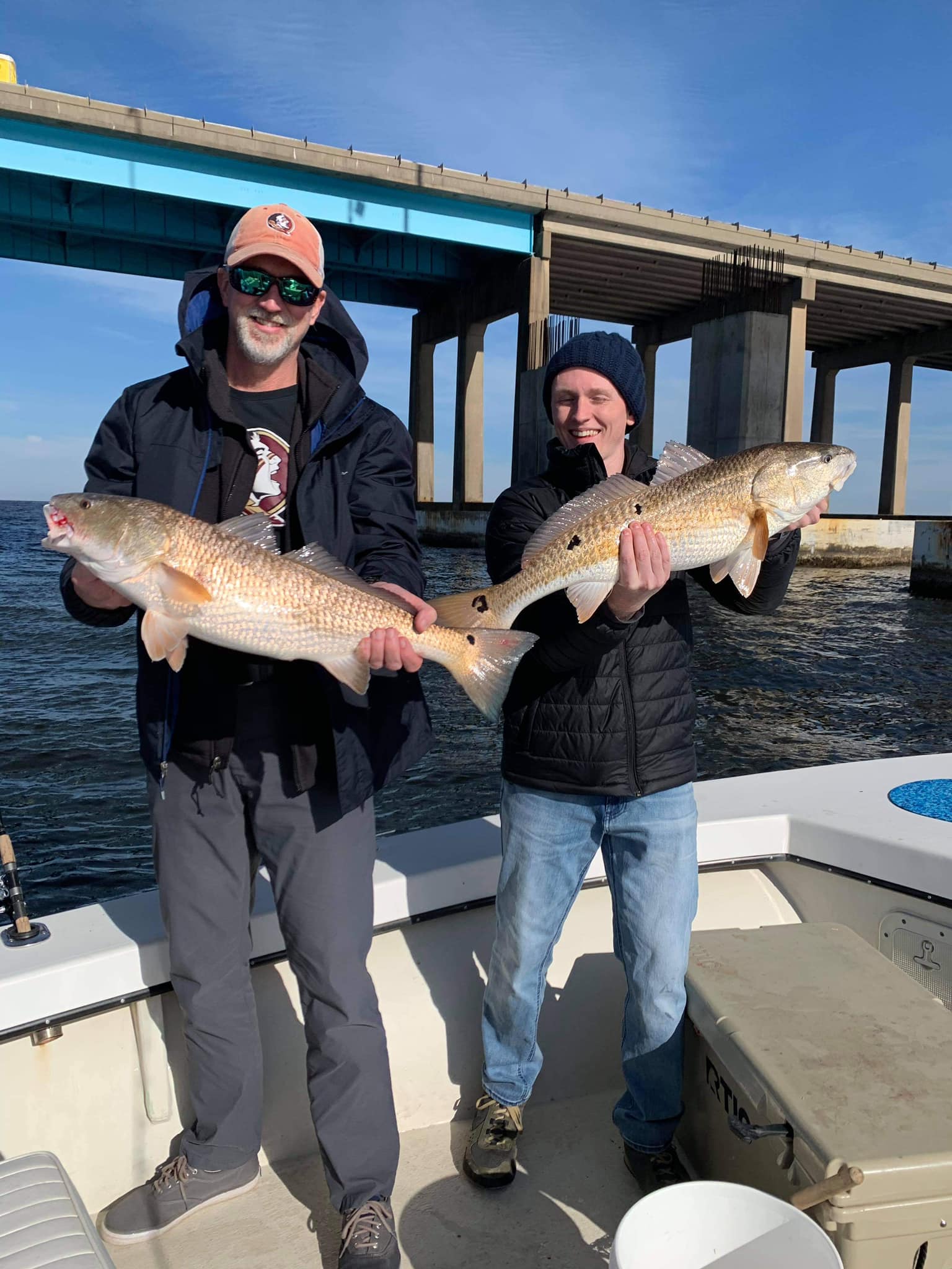 Two redfish, 23 inches, caught in Pensacola