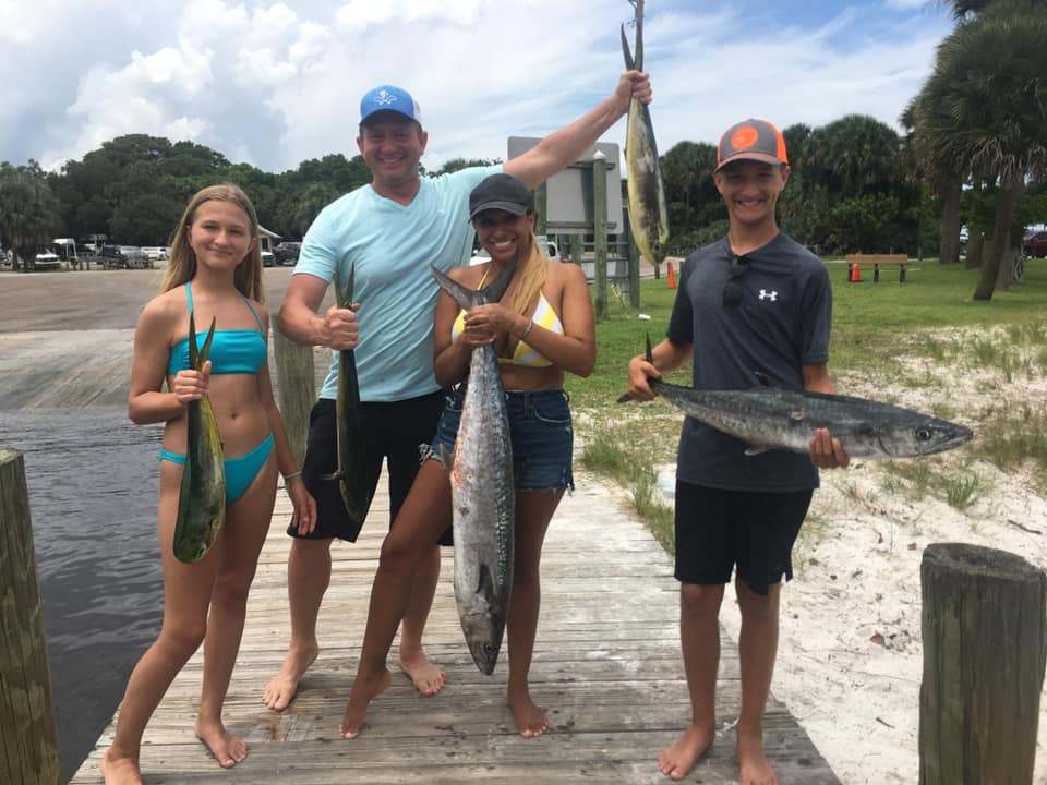 Four cero mackerel and king mackerel fish caught while fishing in Fort Pierce