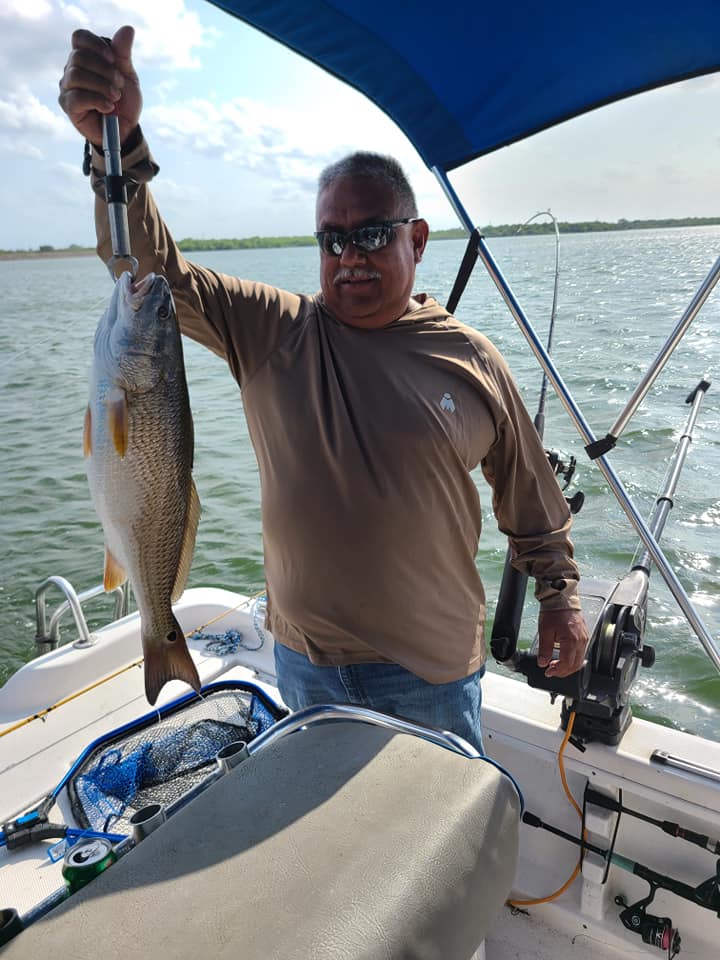 Angler with 18-inch fish catch in San Antonio