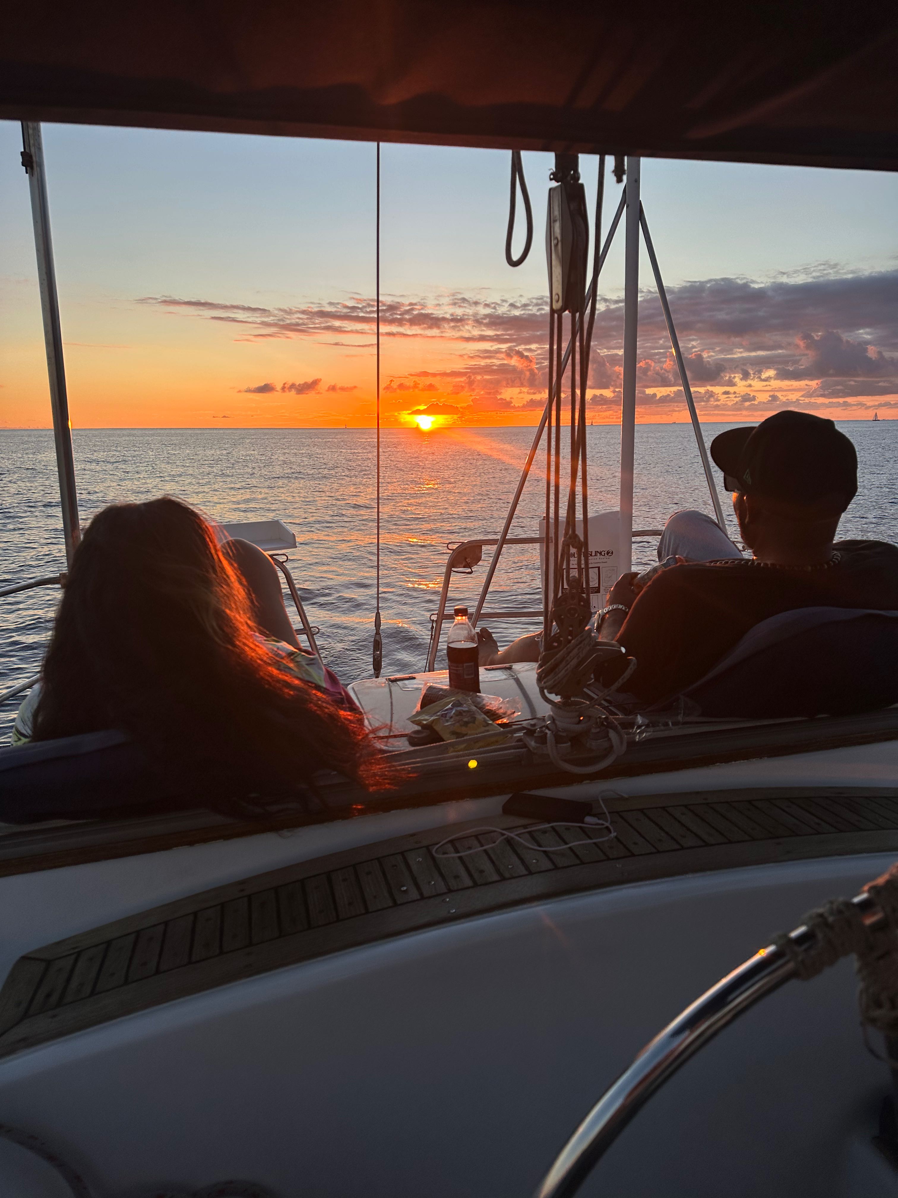 Sunset view from sailboat deck in Honolulu HI during cruise