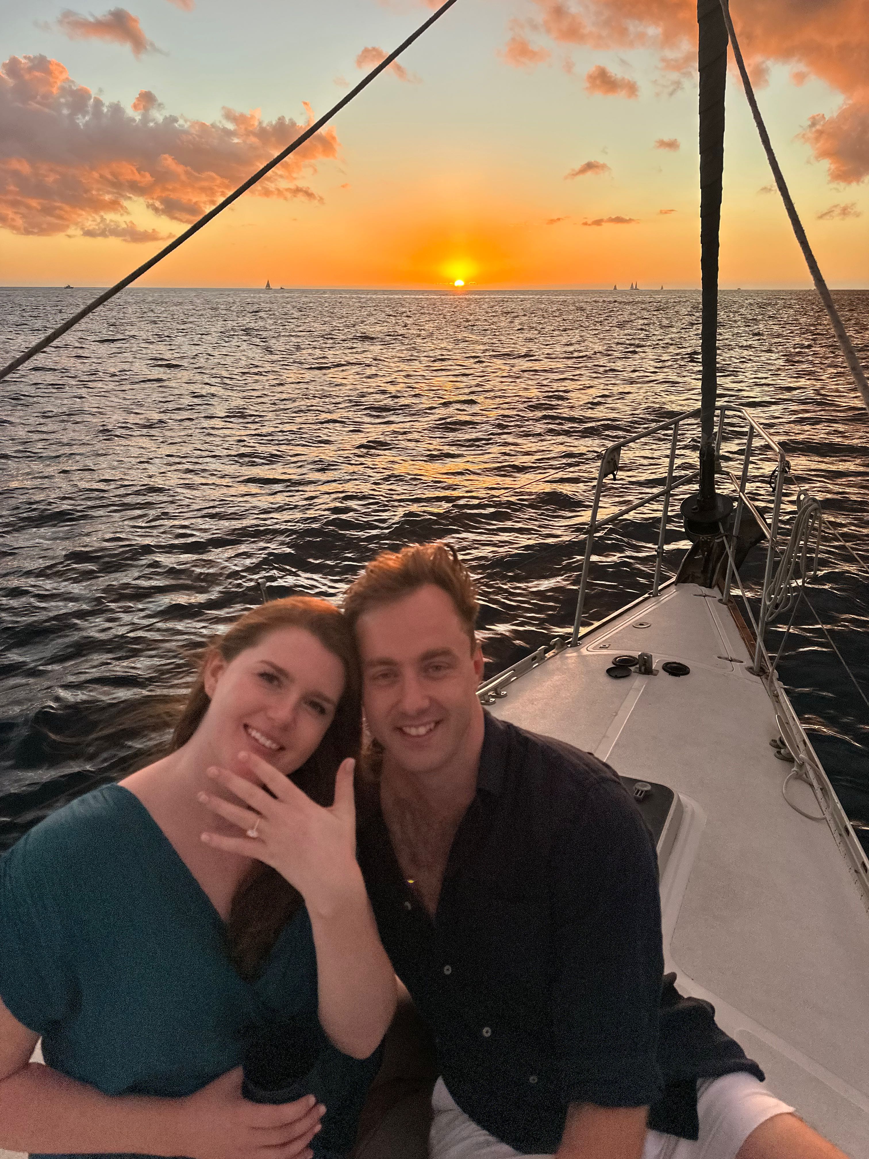 Sunset cruise on sailboat in Honolulu Hawaii with ocean horizon view
