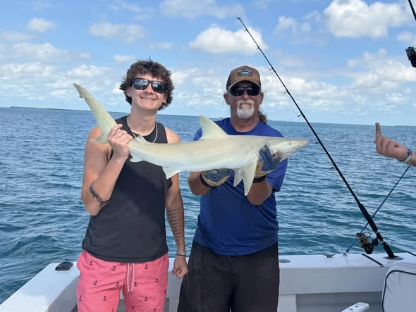 Successful fishing trip in Key West FL showing caught fish on boat deck