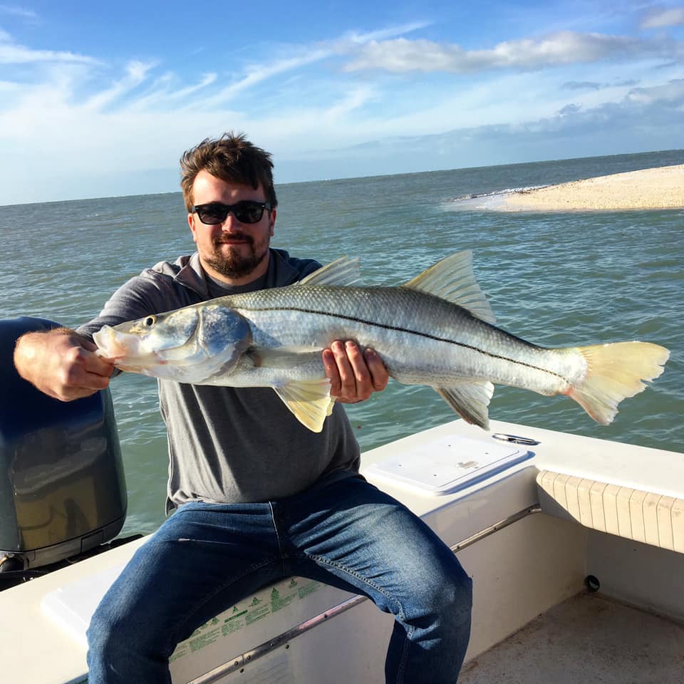 A snook fish caught by two people in Goodland