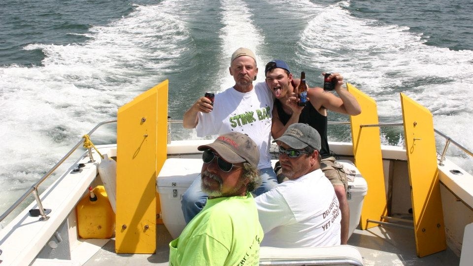Four people enjoying a day at Lewisetta