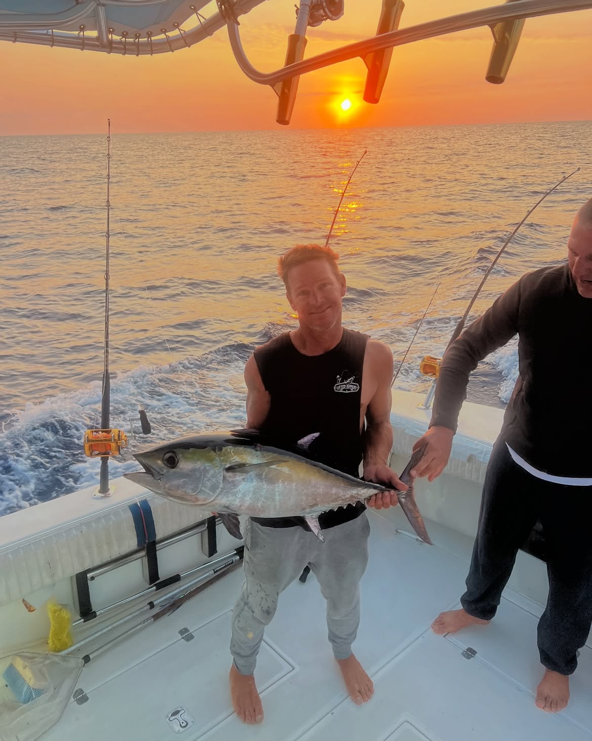 Blackfin tuna caught during fishing trip in Clearwater FL at sunset