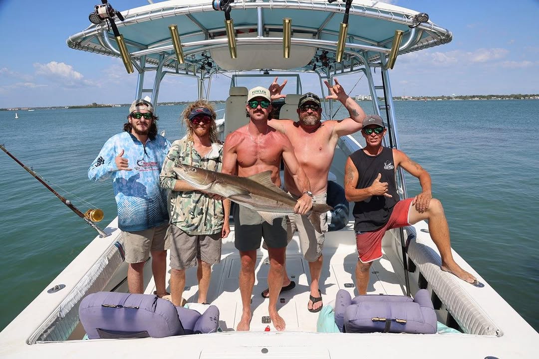 Successful cobia fishing charter in Clearwater FL with large fish catch on boat