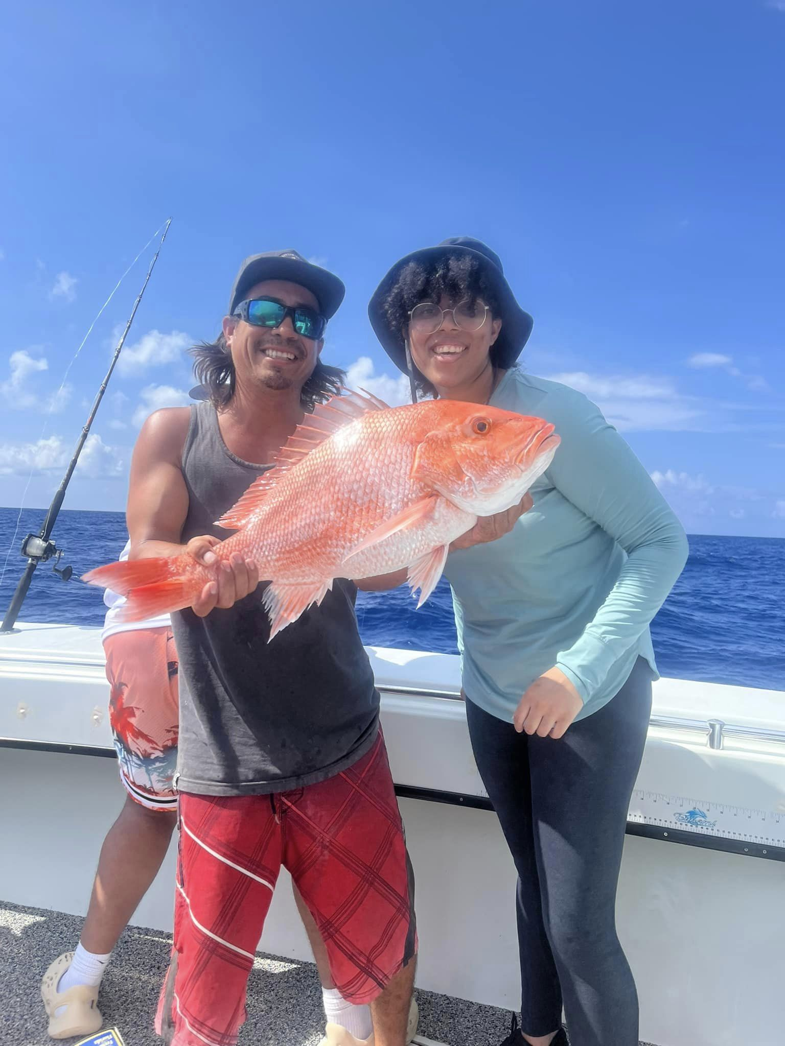 A fisherman holds a 24-inch fish in TX