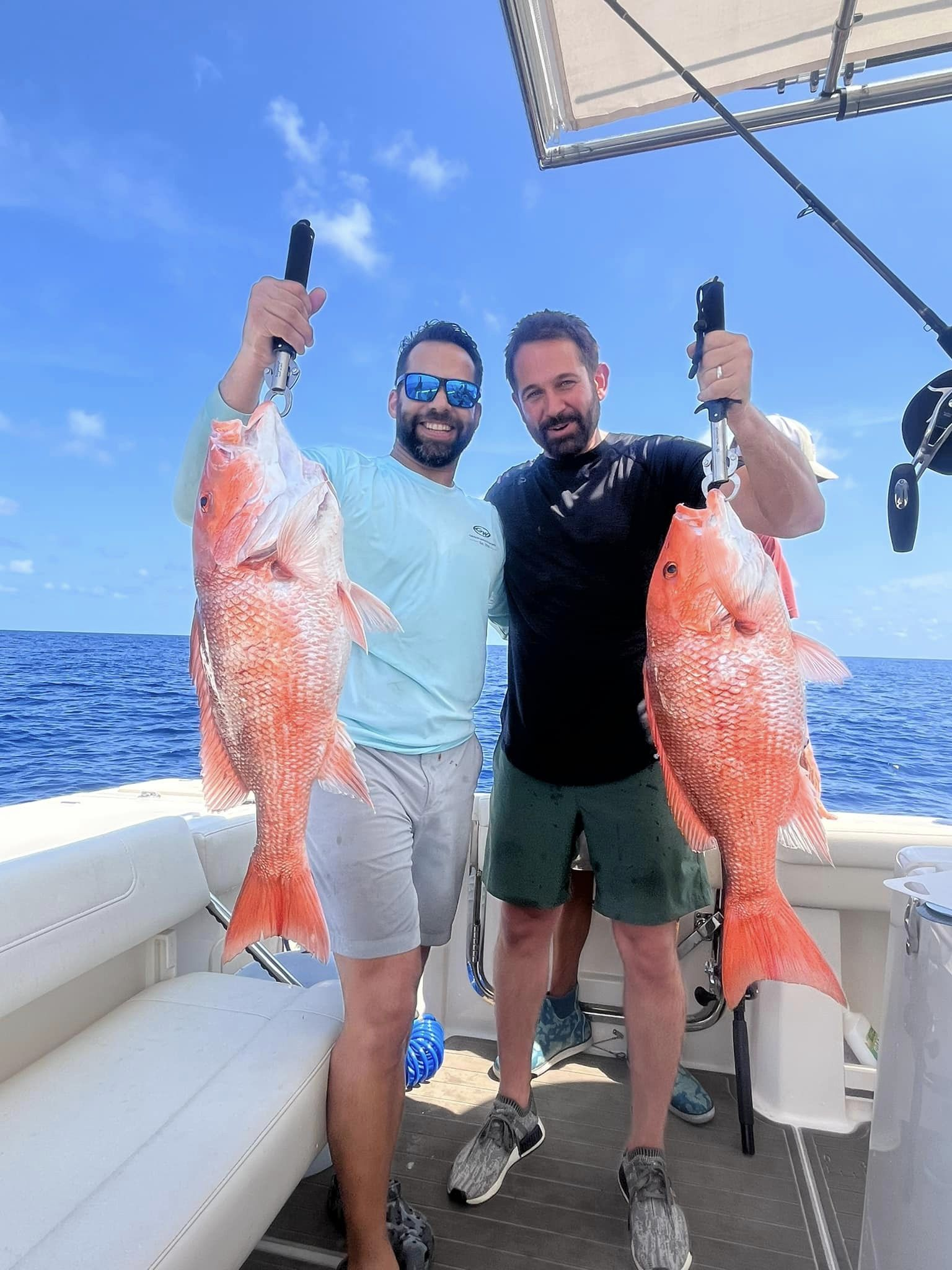 Two grey snapper, 29 inches, fishing in TX