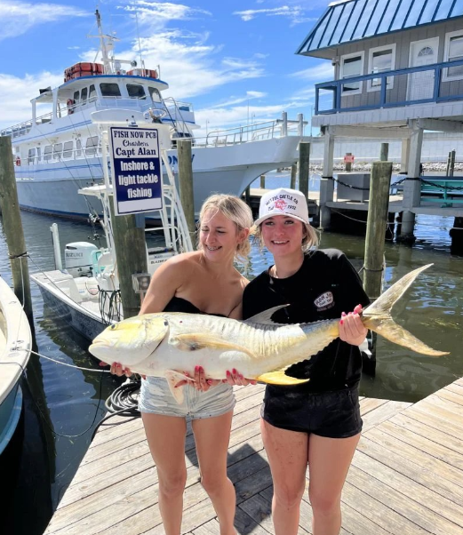 Crevalle jack catch displayed on fishing dock in Panama City FL