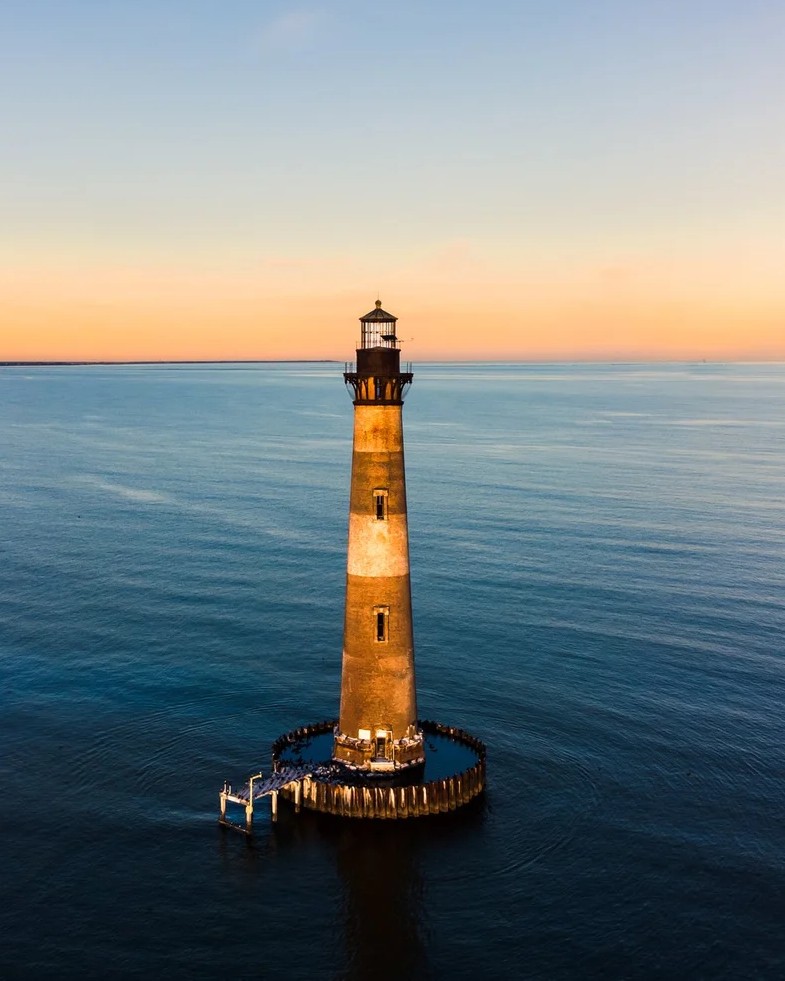 Charleston harbor cruise boat for dolphin watching and historic landmark sightseeing tours