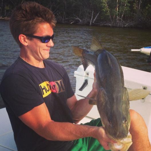 Angler holding a fishing rod in Fort Myers