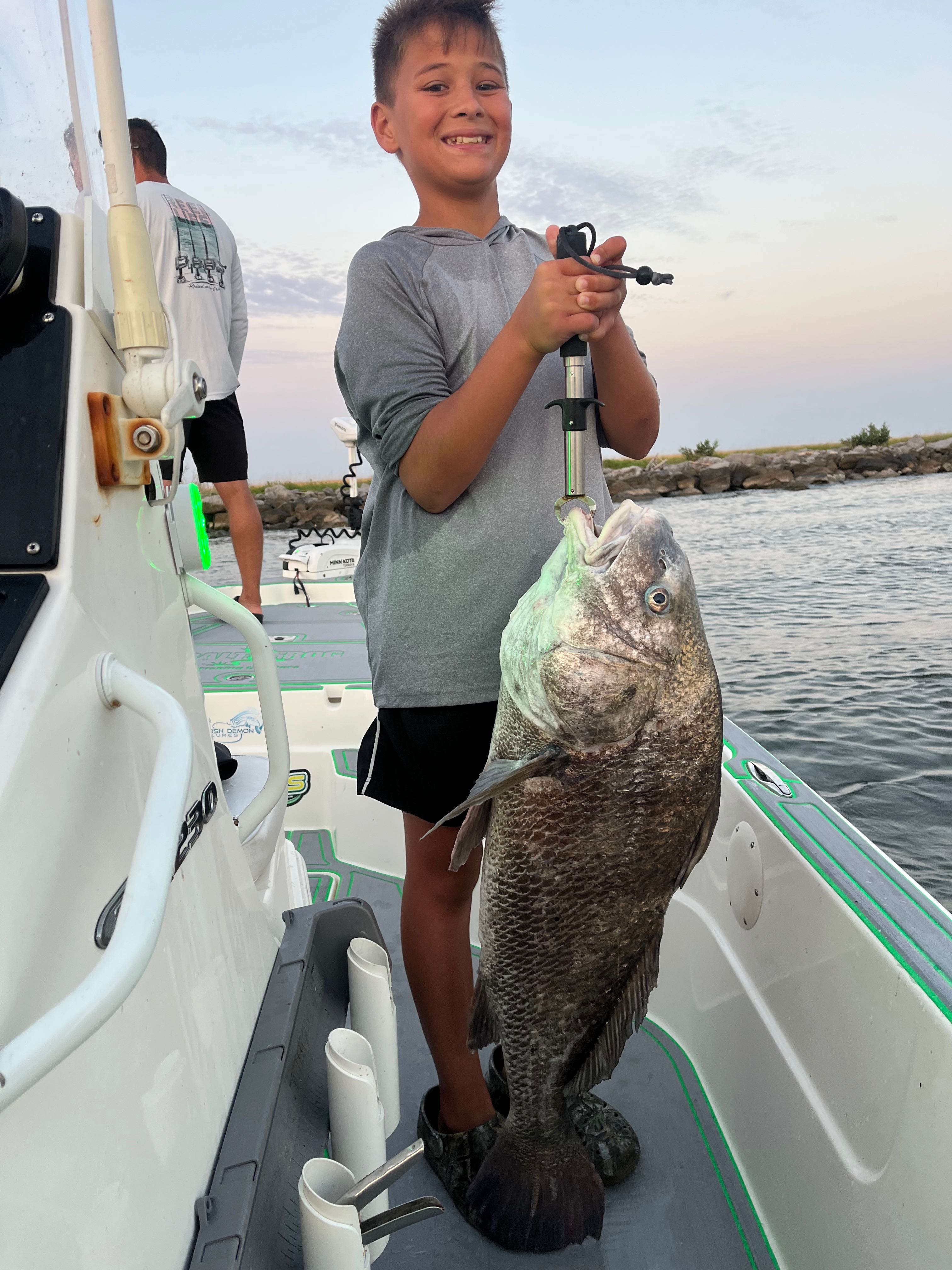 Large black drum fish caught on fishing charter boat in St Bernard Louisiana waters