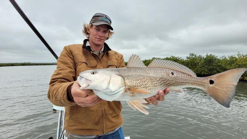 Photograph of a redfish measuring 40 inches caught while fishing in Oak Hill