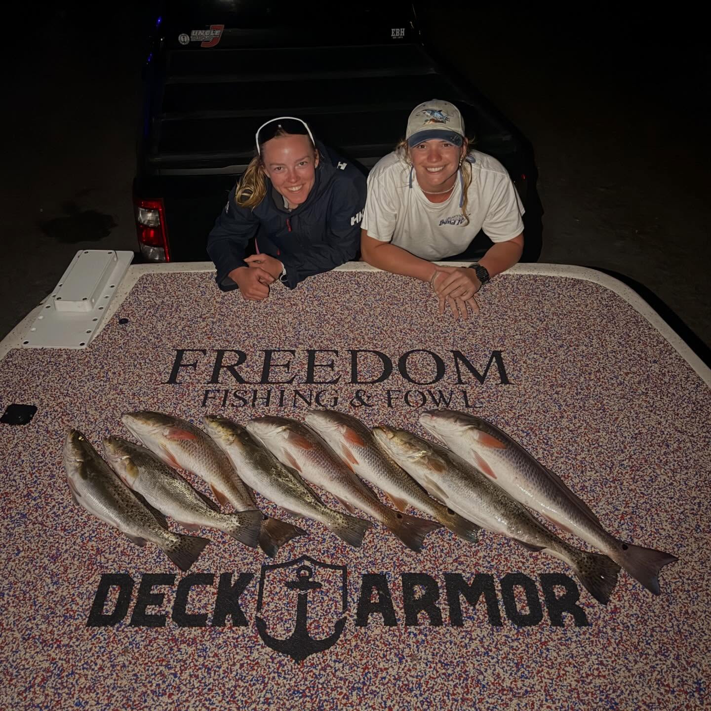 Successful fishing trip displaying redfish and speckled trout catch in Spring Hill FL