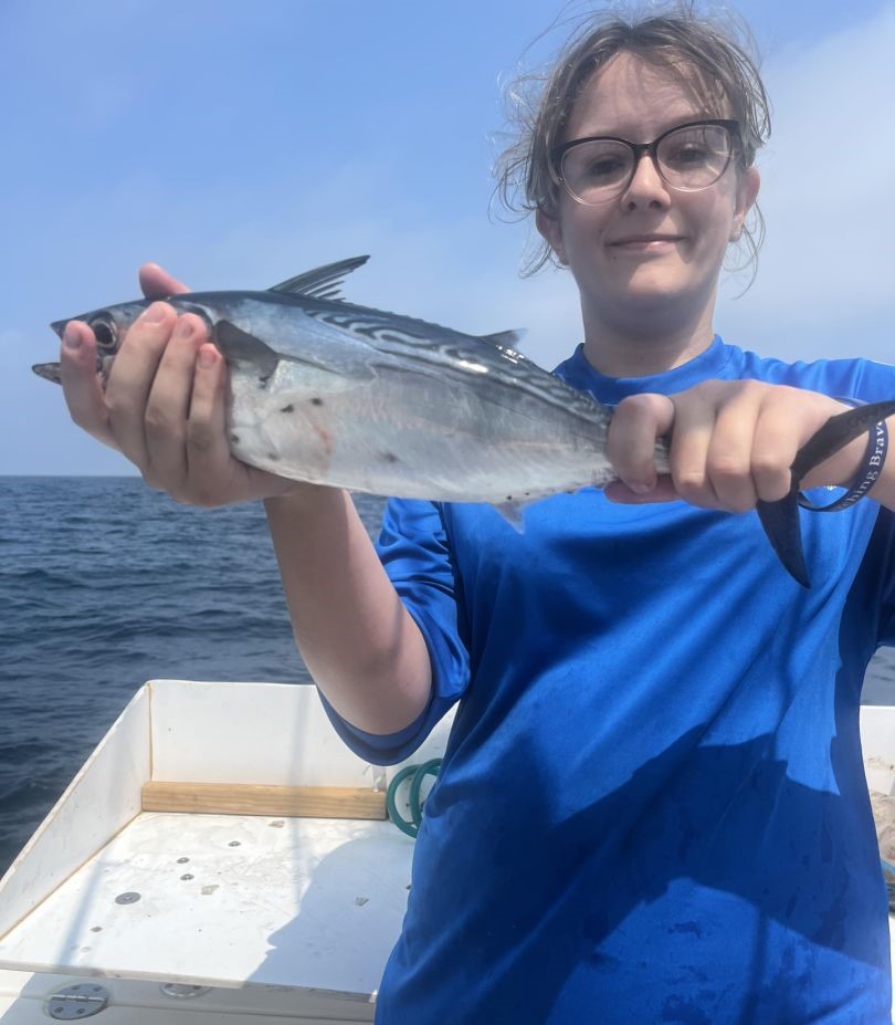 Angler with a 14-inch fish in Gulf Breeze