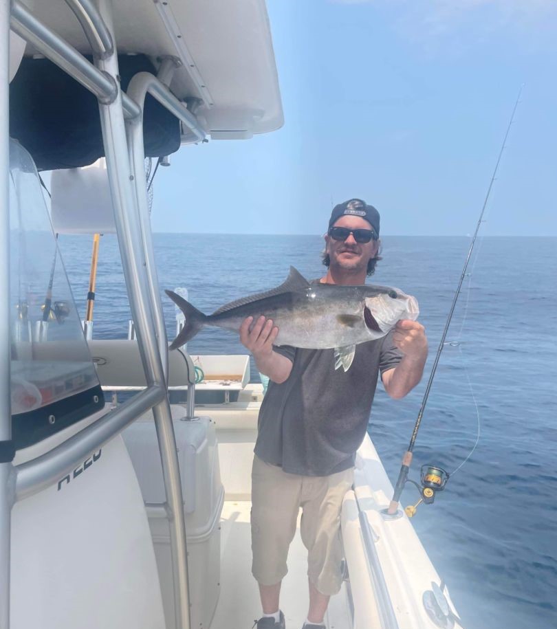 Photograph of a greater amberjack, a 26-inch fish caught while fishing in FL