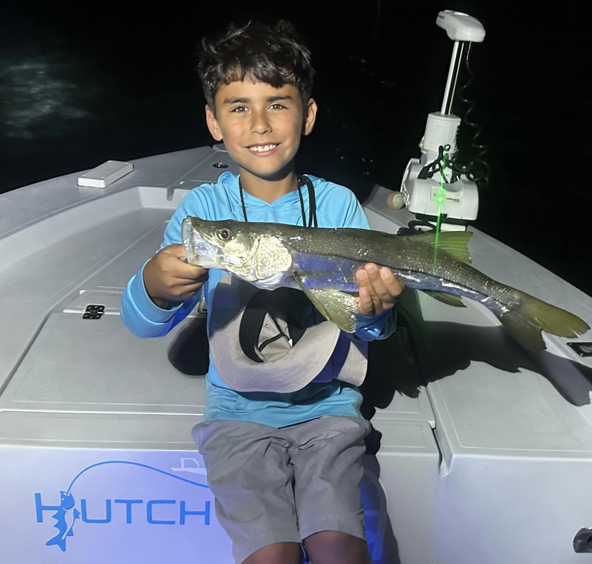 Angler with a 21-inch fish in Key Biscayne
