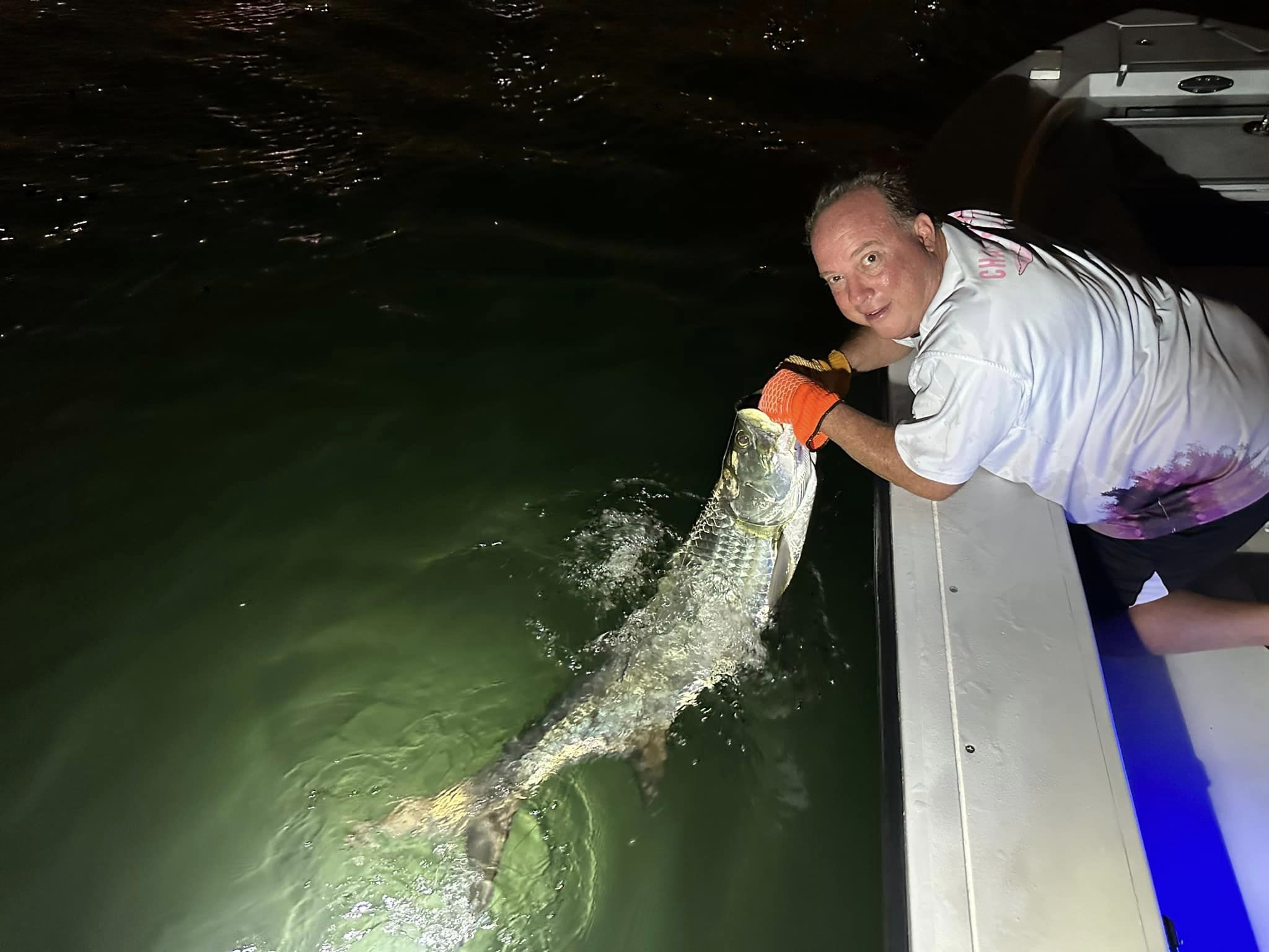A lone angler in Key Biscayne catching a 17-inch fish