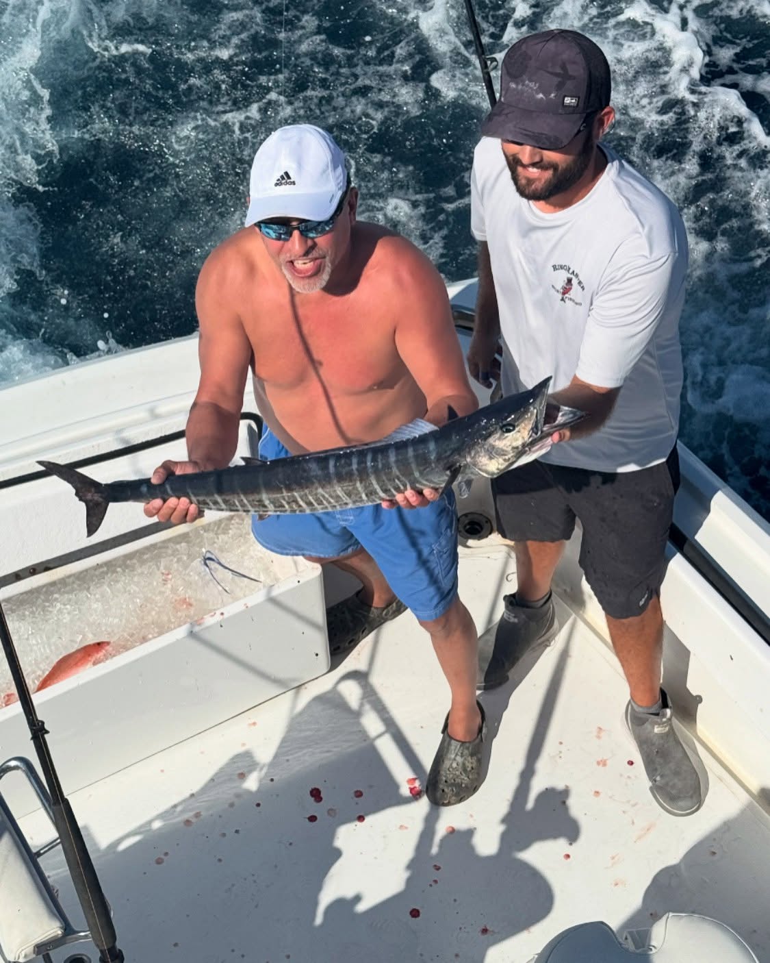 Wahoo fish caught by three people in Pompano Beach