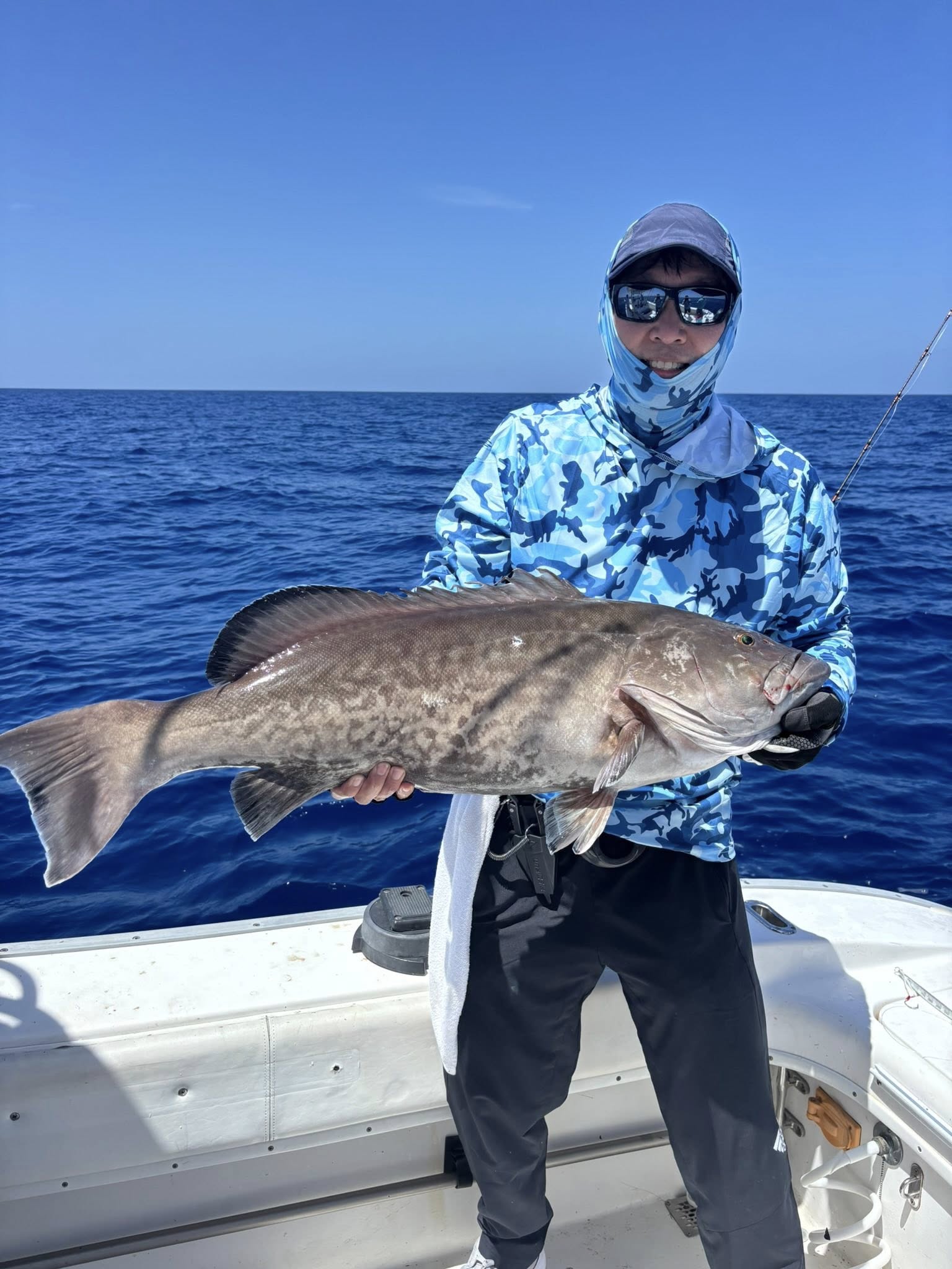 Angler with a fishing rod enjoying the outdoors in Largo