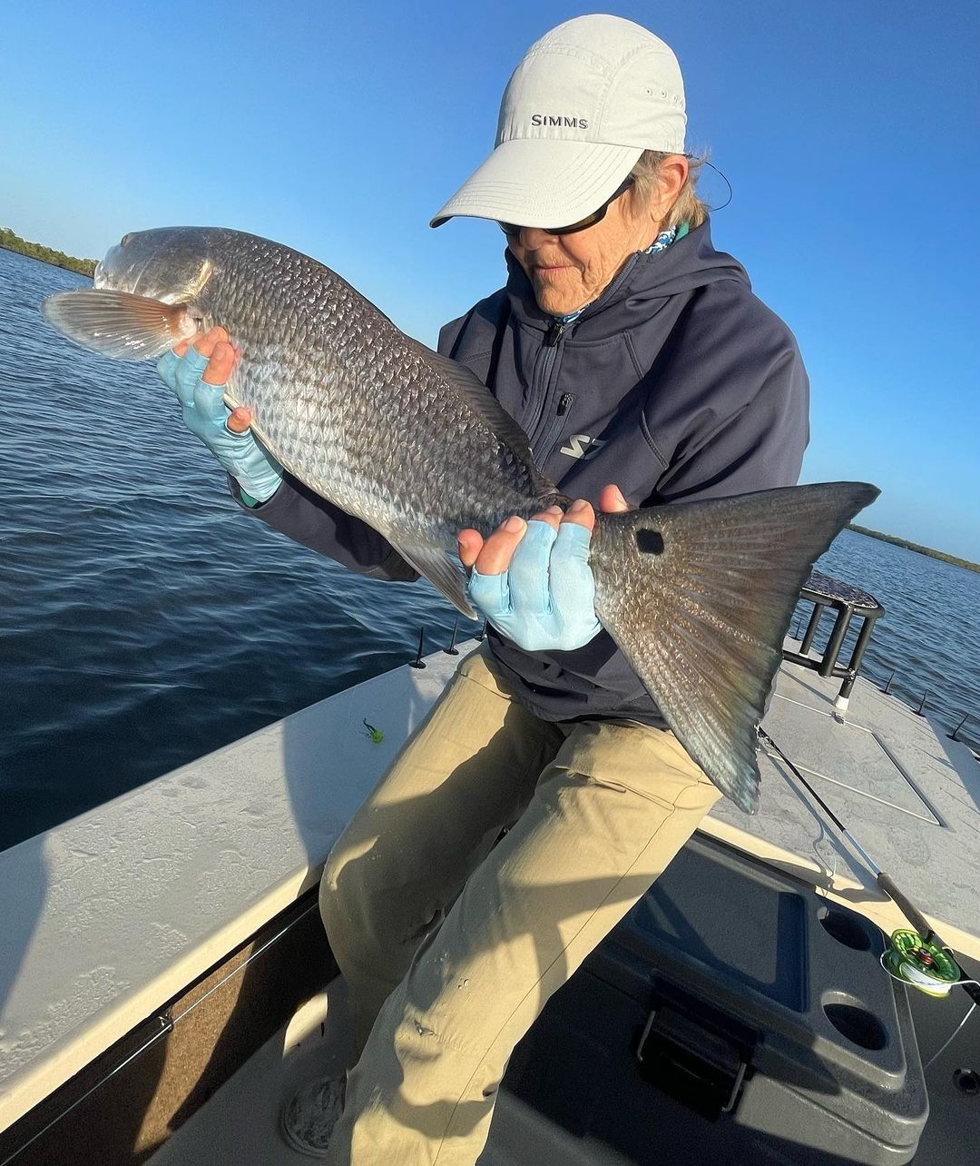 One fisherman catching a fish in Florida