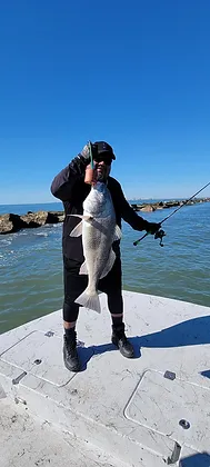 A person fishing in TX