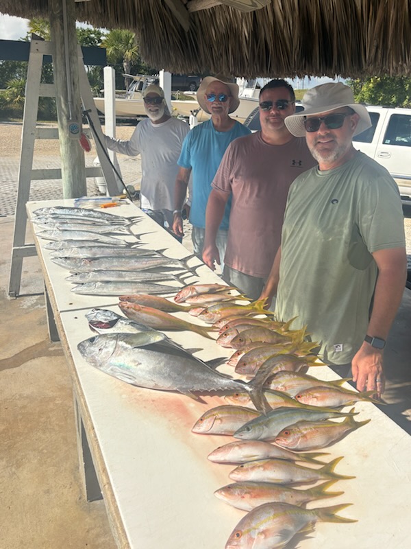 4 people on a fishing tour in Big Pine Key, Florida