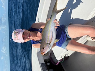 Person enjoying fishing, water sports and tours in FL