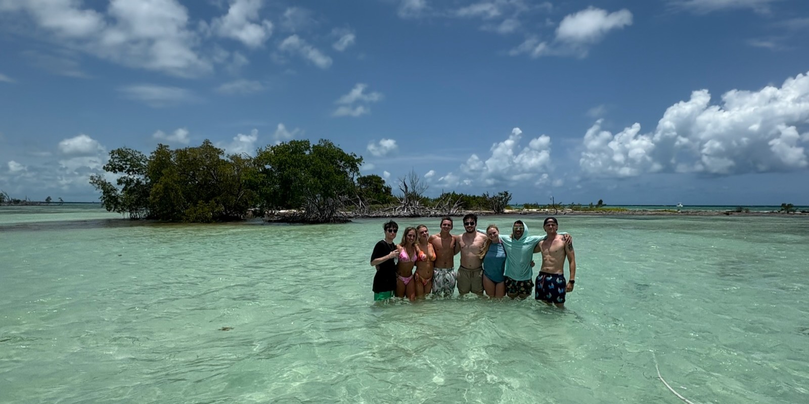 Captain Troy's 28ft boat touring Big Pine Key sandbars with dolphins and sea turtles, Florida Keys