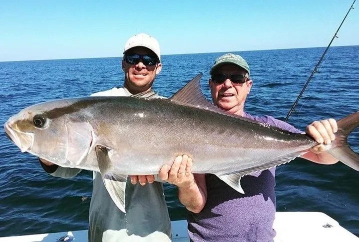 A pair of anglers enjoying a fishing trip in Houston, Texas
