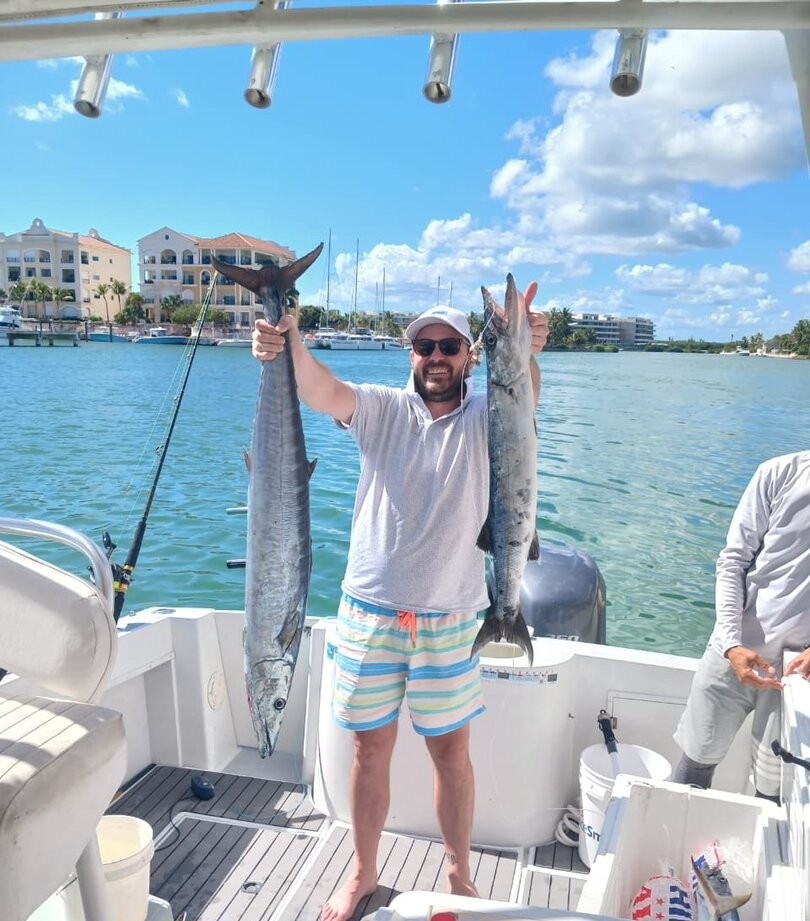 Great barracuda and wahoo fish caught during fishing trip in Punta Cana