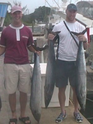 Anglers holding a 33-inch catch in Florida
